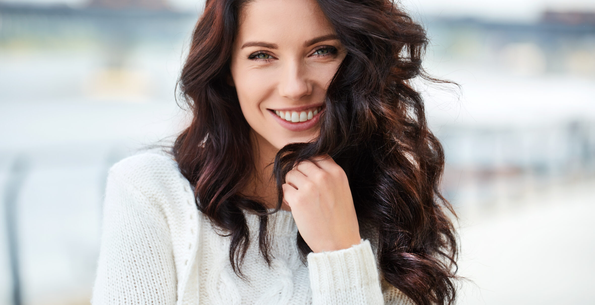A brunette woman with beautiful flowing long hair